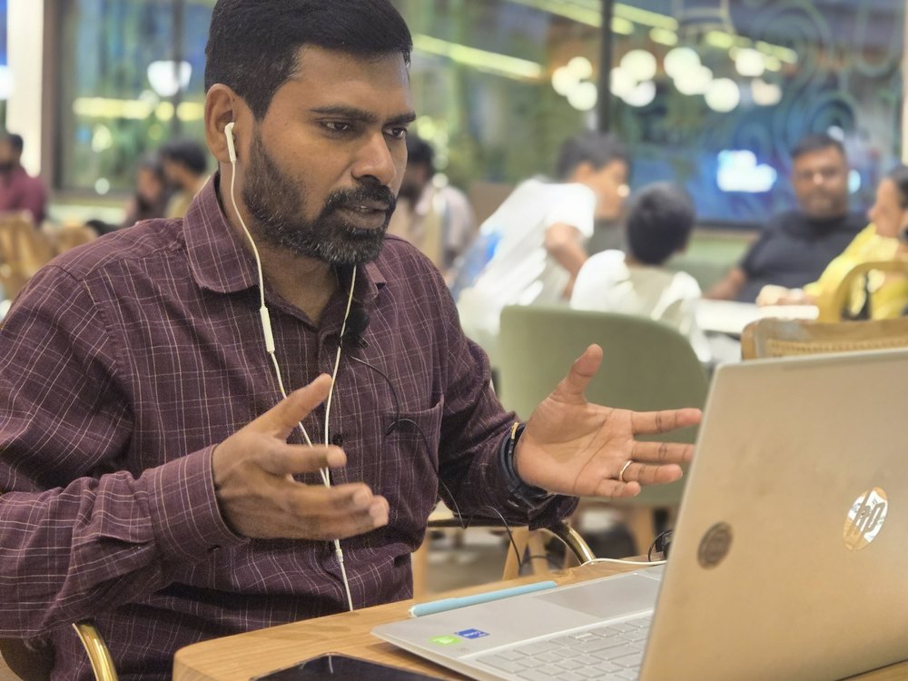 Dinesh Balakrishnan mid-session on a video call